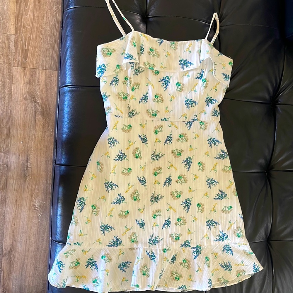 This is a copper key dress. It is white floral dress.